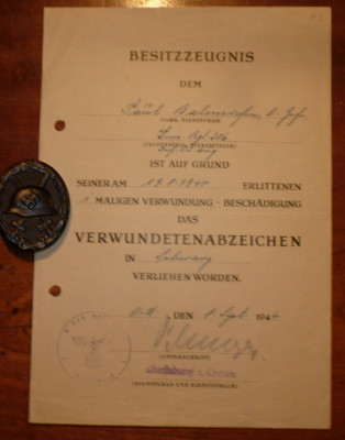 Besitzzeugnis voor het Verwundetenabzeichen in Schwartz