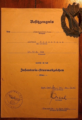 Besitzzeuchnis voor het infanterie Sturm Abzeichen met Abzeichen.(30-9-41) ondertekend door Georg Postel Schwerterträger zum Ritterkreutz