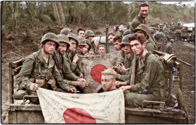 Ingekleurde foto van mariniers op Cape Gloucester 15 jan 1943 bij Hill 660