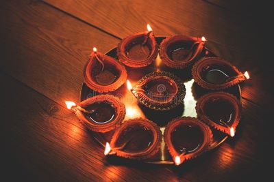 diwali-oil-lamp-diya-brass-plate-diya-thali-brass-plate-thali-full-terracotta-diya-oil-lamps-ready-101029258.jpg