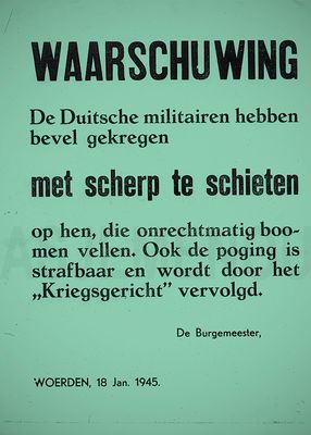 Bomen werden massaal door de kou lijdende bevolking gekapt. <br />De Duitse bezetter trad hiertegen genadeloos op.<br />Via aanplakbiljetten werden de inwoners van Woerden gewaarschuwd.